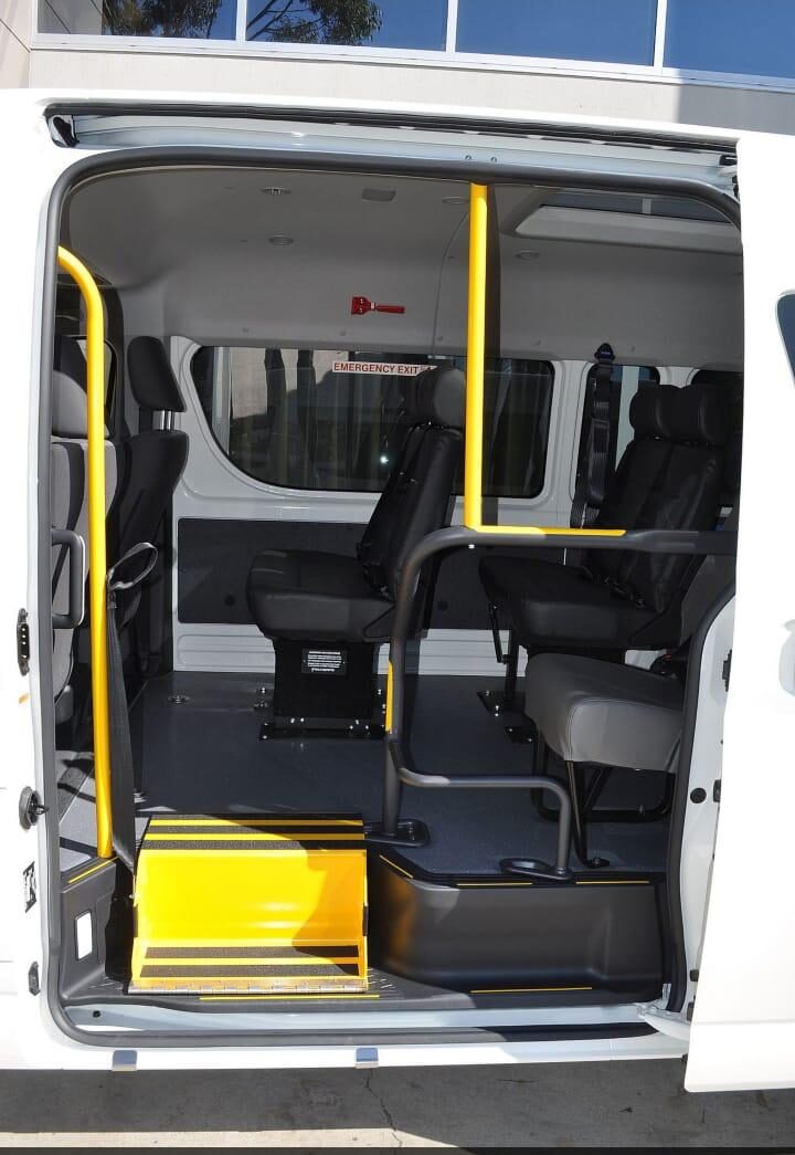 The interior of a wheelchair-accessible maxi taxi with floor anchor points
