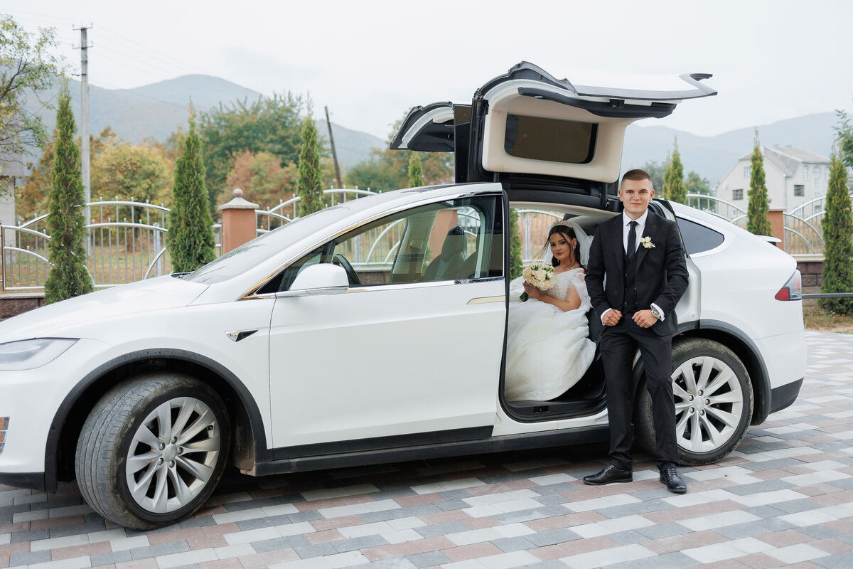 A wedding party arriving in a transfer vehicle